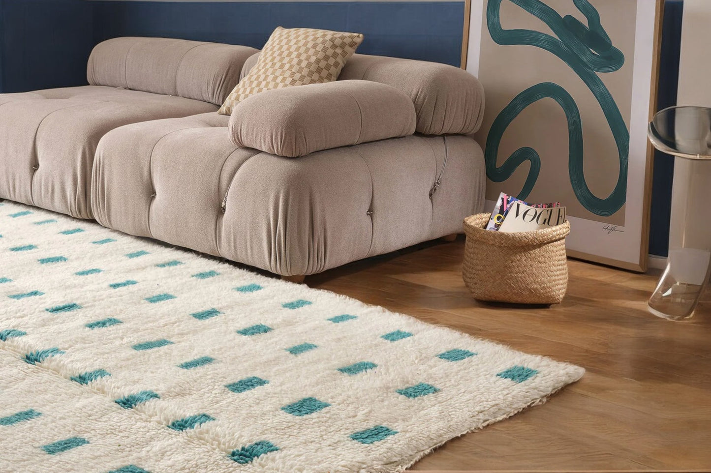 A contemporary Moroccan rug with turquoise geometric patterns on a cream wool base, handwoven for a modern minimalist style. Ideal for living rooms, bedrooms, or offices, this rug is available in customizable sizes.