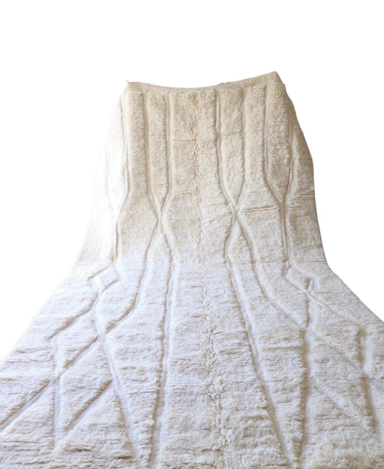 Authentic handmade Moroccan Beni Ourain wool rug in plush cream. Soft, luxurious, and perfect for minimalist, boho, and modern interiors. This high-pile Berber carpet adds warmth and elegance to bedrooms, living rooms, and cozy home spaces. Ethically handwoven.