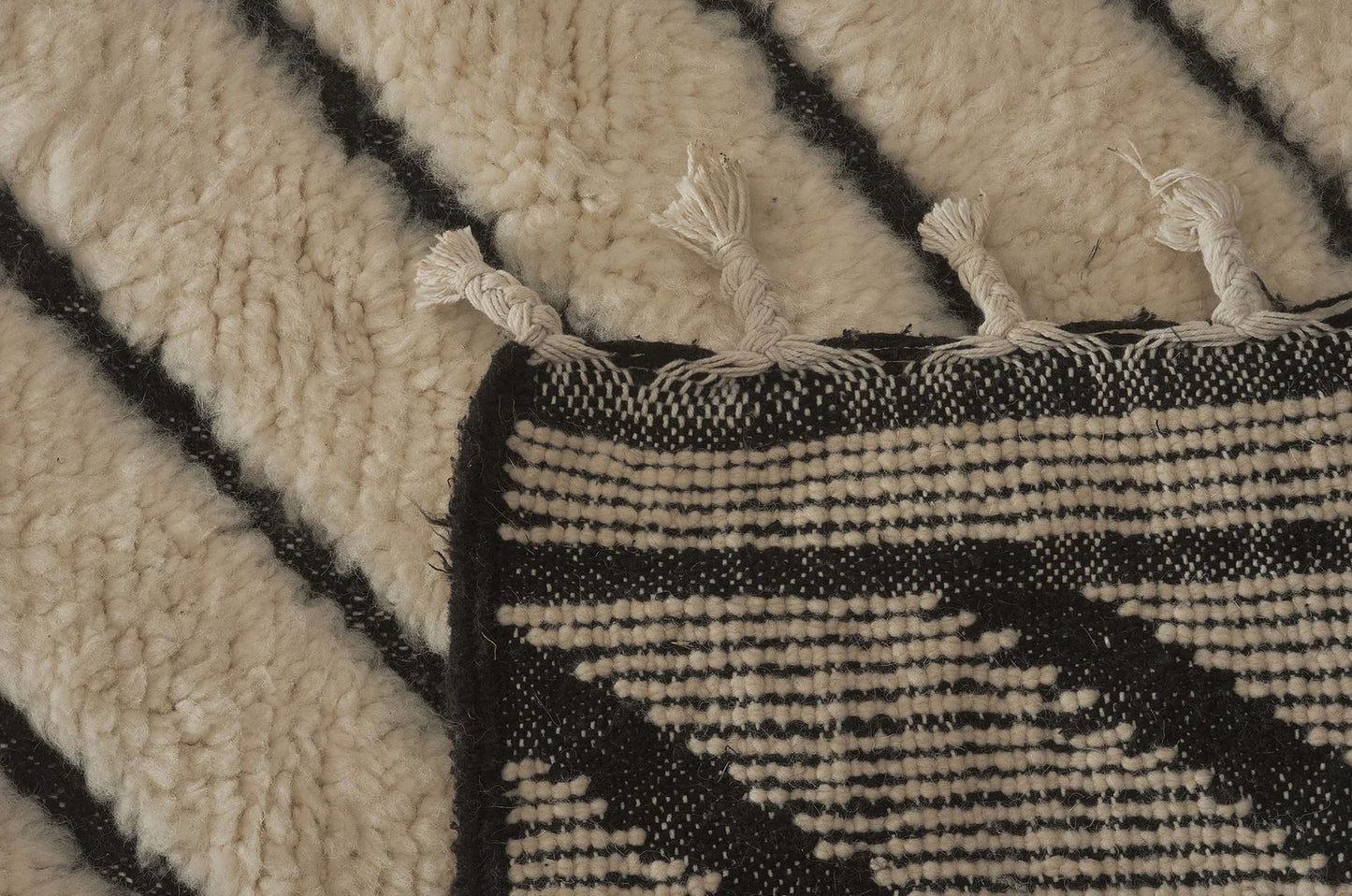 Handmade Wool Rug with Bold Stripe and Checkered Pattern – Black and White Modern Boho Area Rug, Artistic Home Decor
Description:
Make a statement with this handmade wool rug, featuring a striking black and white design with alternating diagonal stripes and a central checkered pattern. This artistic rug is perfect for adding visual interest to modern and boho interiors, making it an ideal centerpiece for living rooms, bedrooms, or creative spaces. Crafted from high-quality wool, it provides both durability
