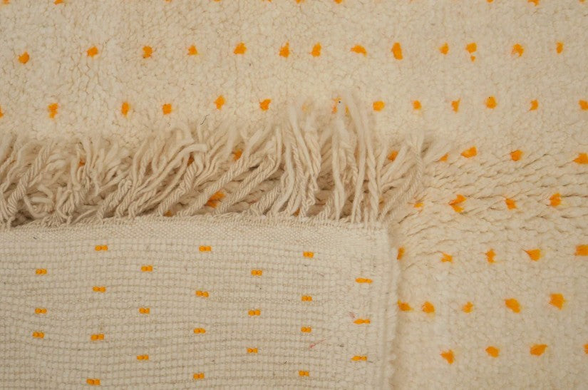 handmade wool rug yellow dotted rug minimalist decor cozy rug boho area rug modern accent rug eco-friendly decor living room rug bedroom rug unique home decor artisanal rug soft wool rug subtle color pop