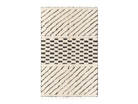 Handmade Wool Rug with Bold Stripe and Checkered Pattern – Black and White Modern Boho Area Rug, Artistic Home Decor
Description:
Make a statement with this handmade wool rug, featuring a striking black and white design with alternating diagonal stripes and a central checkered pattern. This artistic rug is perfect for adding visual interest to modern and boho interiors, making it an ideal centerpiece for living rooms, bedrooms, or creative spaces. Crafted from high-quality wool, it provides both durability 